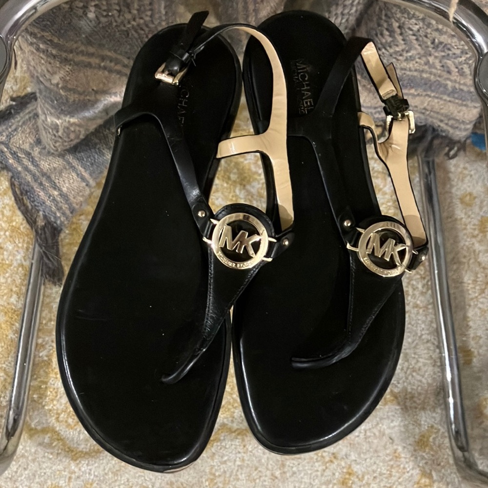Black and gold flats